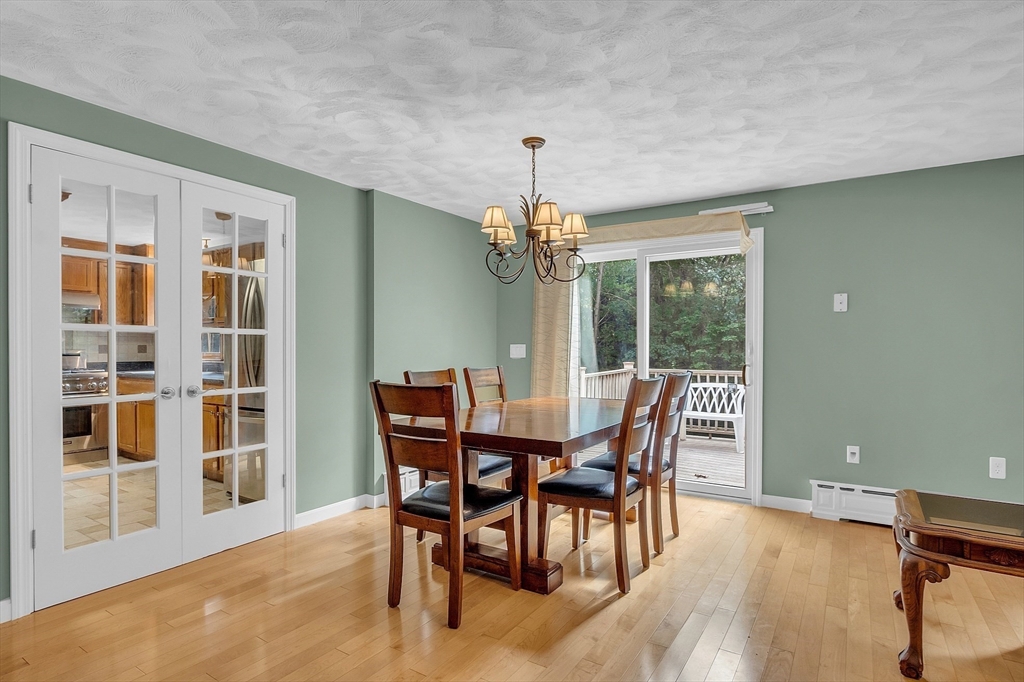 247 Boston Road Chelmsford, MA 01824 - Photo 14 of 26 a view of a dining room with furniture window and outside view