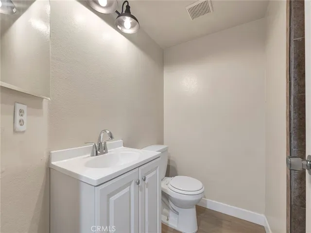 a bathroom with a sink and a toilet