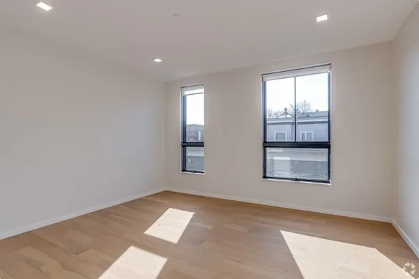 an empty room with windows