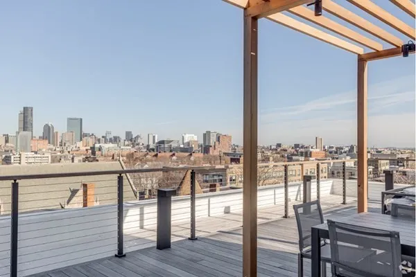 a view of a balcony with city view