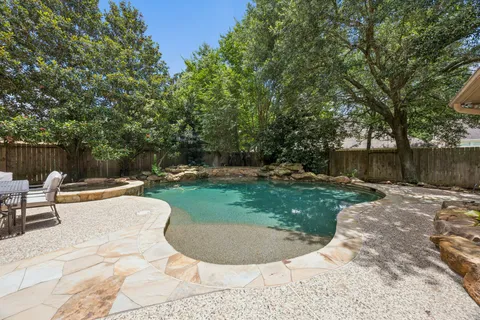 $949,000 | 23 Broadweather Place, The Woodlands, TX 77382