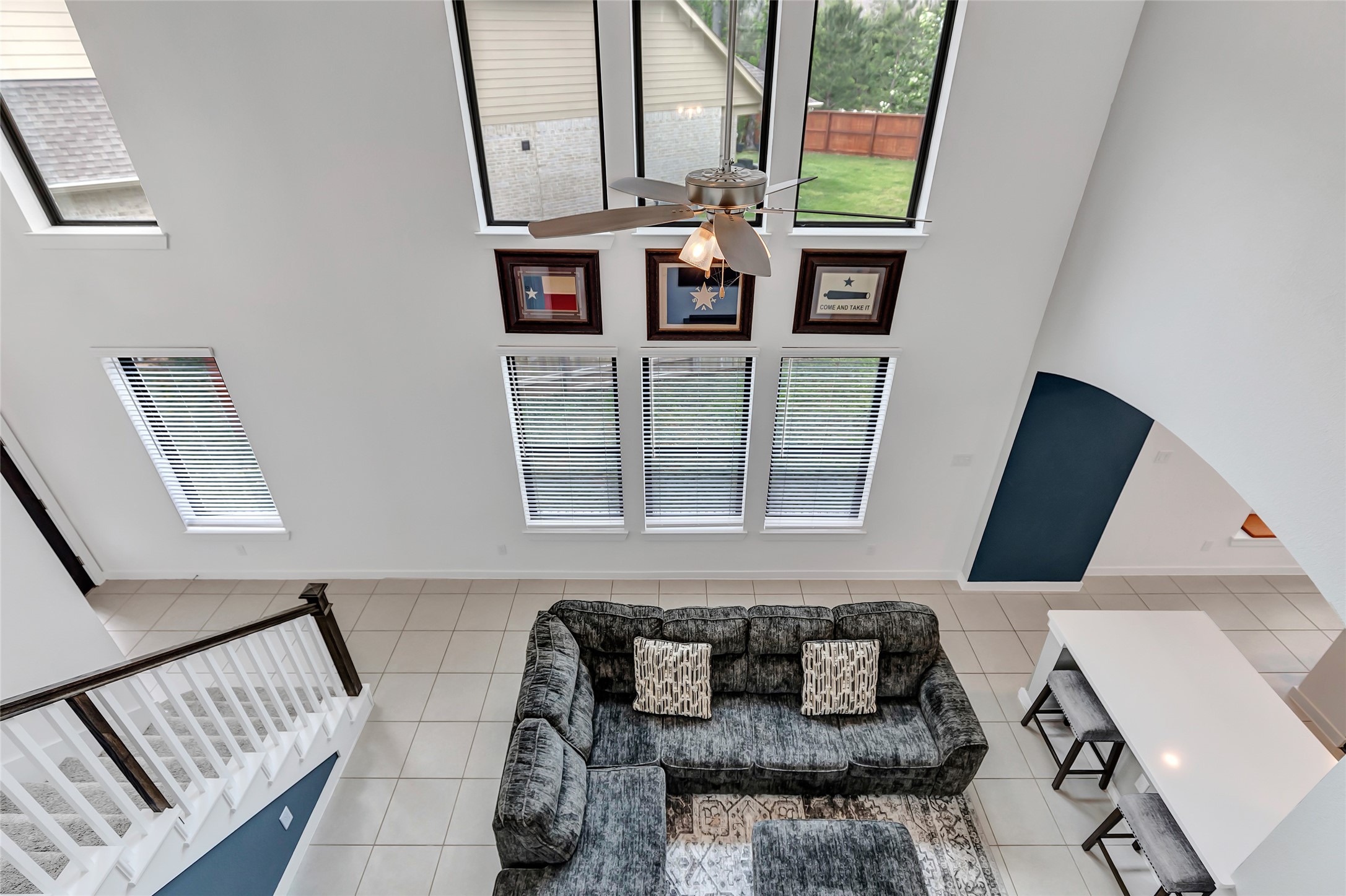 527 Chestnut Reef Court Conroe, TX 77304 - Photo 10 of 40 a view of a livingroom with furniture and staircase