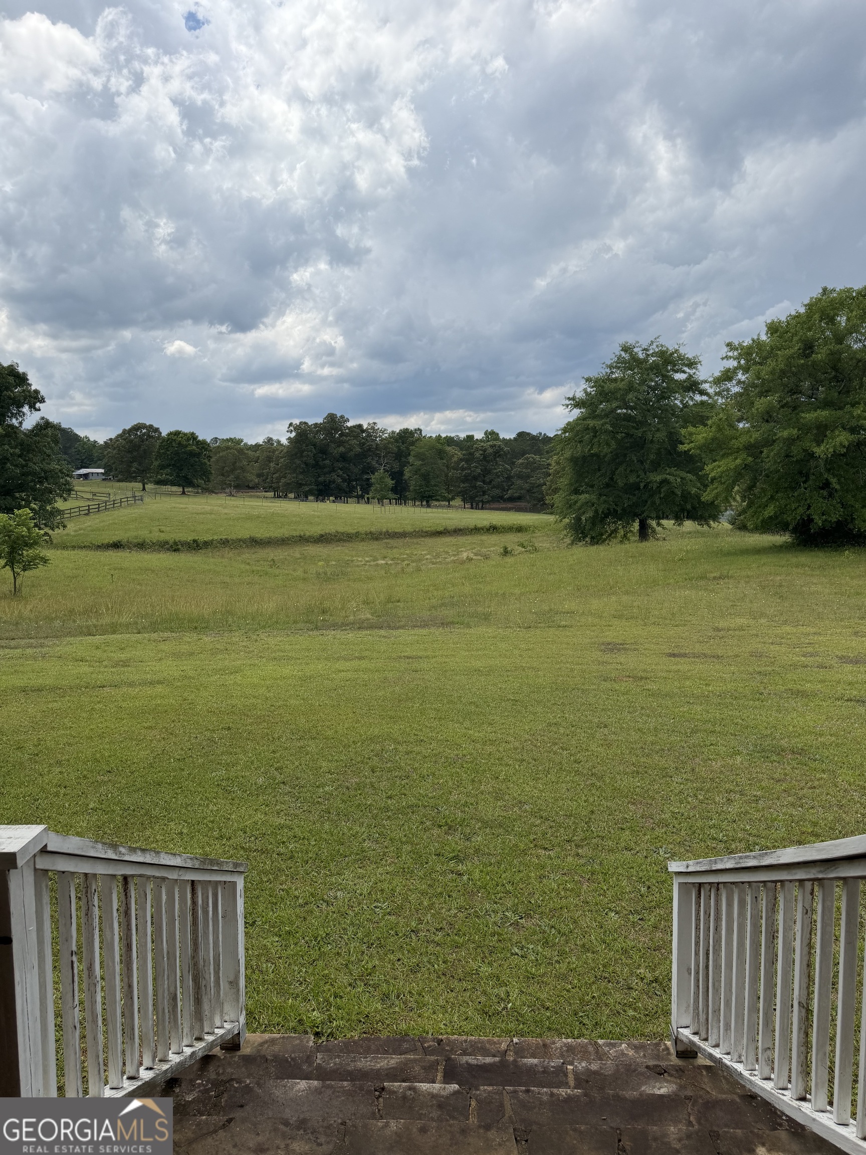 302 Norris Road Barnesville, GA 30204 - Photo 3 of 65 a view of an ocean from a balcony