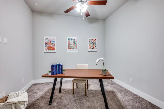 a workspace with furniture and window