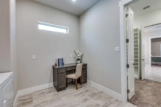 a workspace with furniture and wooden floor