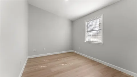 a view of a room with a window