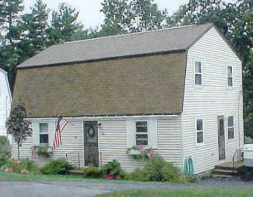 34 Westview Road Worcester, MA 01602 - Photo 1 of 1 a view of a white house next to a yard