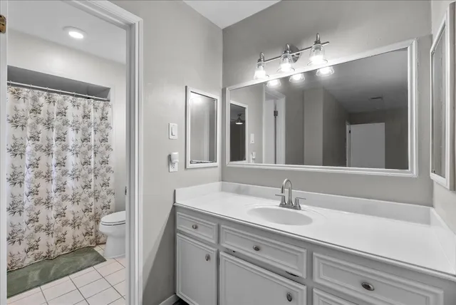 a view of a house with backyard porch and sitting area