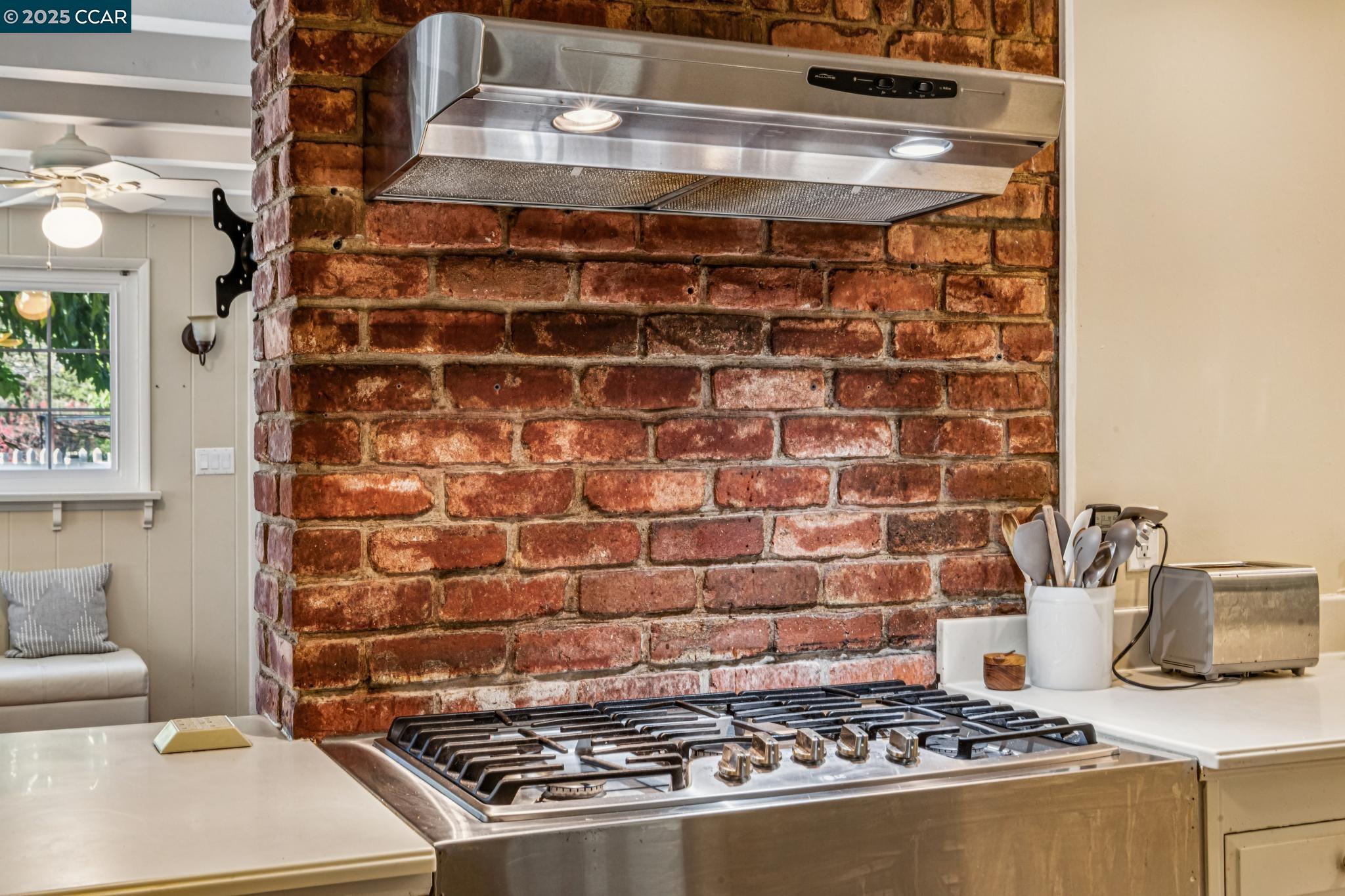 521 El Pintado Road Danville, CA 94526 - Photo 8 of 11 a stove top oven sitting inside of a kitchen
