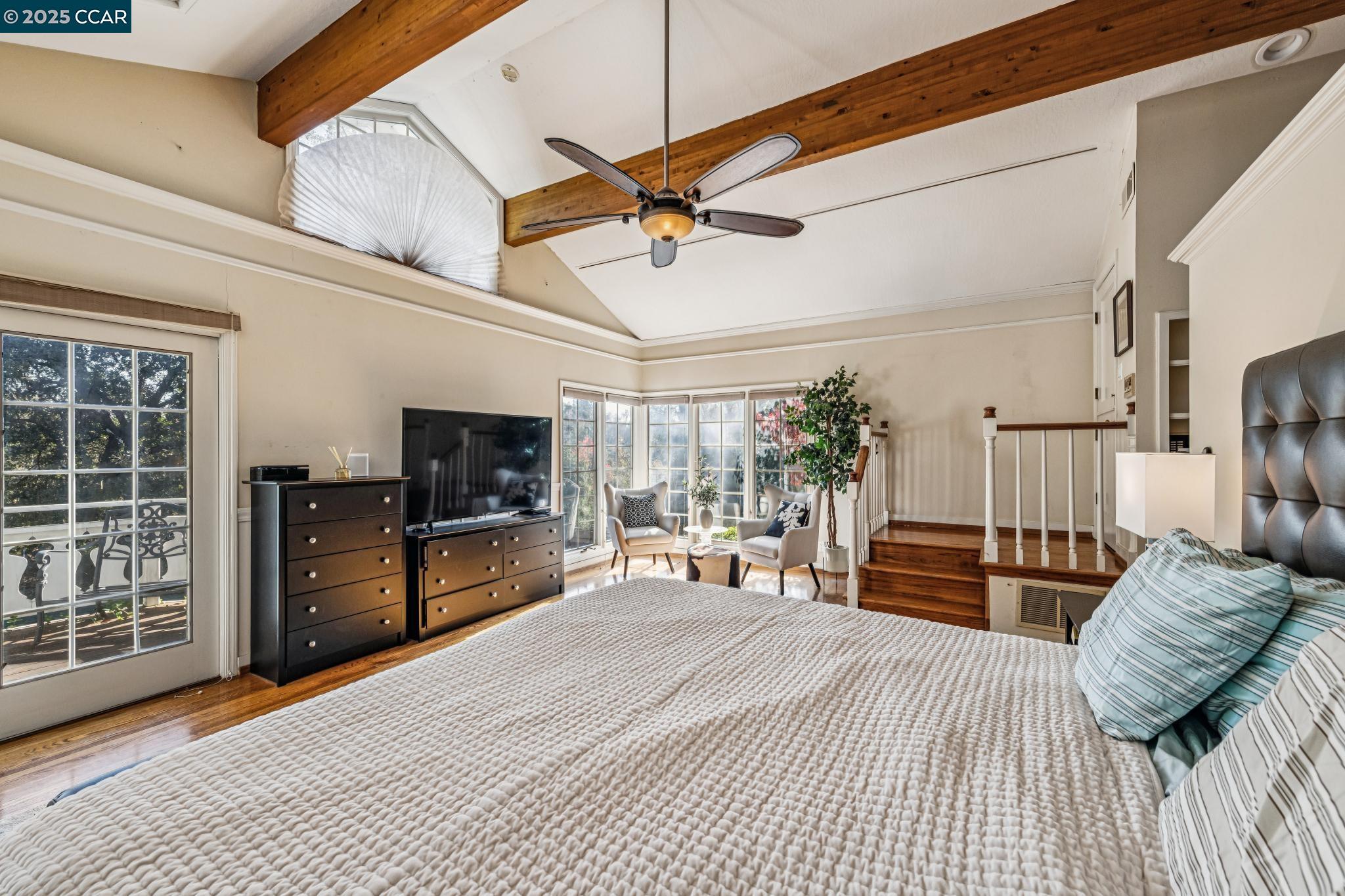 521 El Pintado Road Danville, CA 94526 - Photo 9 of 11 a bedroom with furniture and a flat screen tv