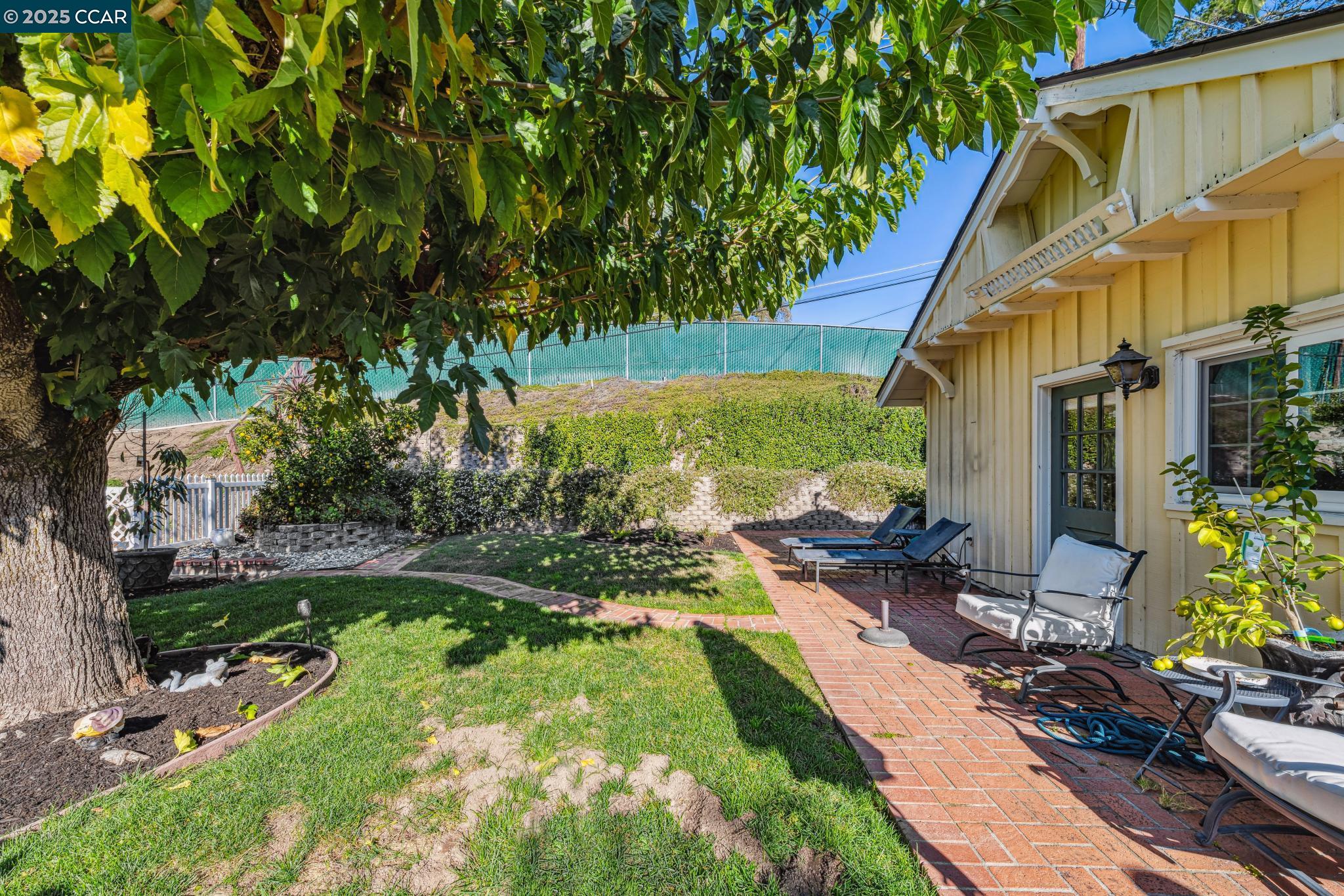 521 El Pintado Road Danville, CA 94526 - Photo 10 of 11 a view of backyard with swimming pool and outdoor seating