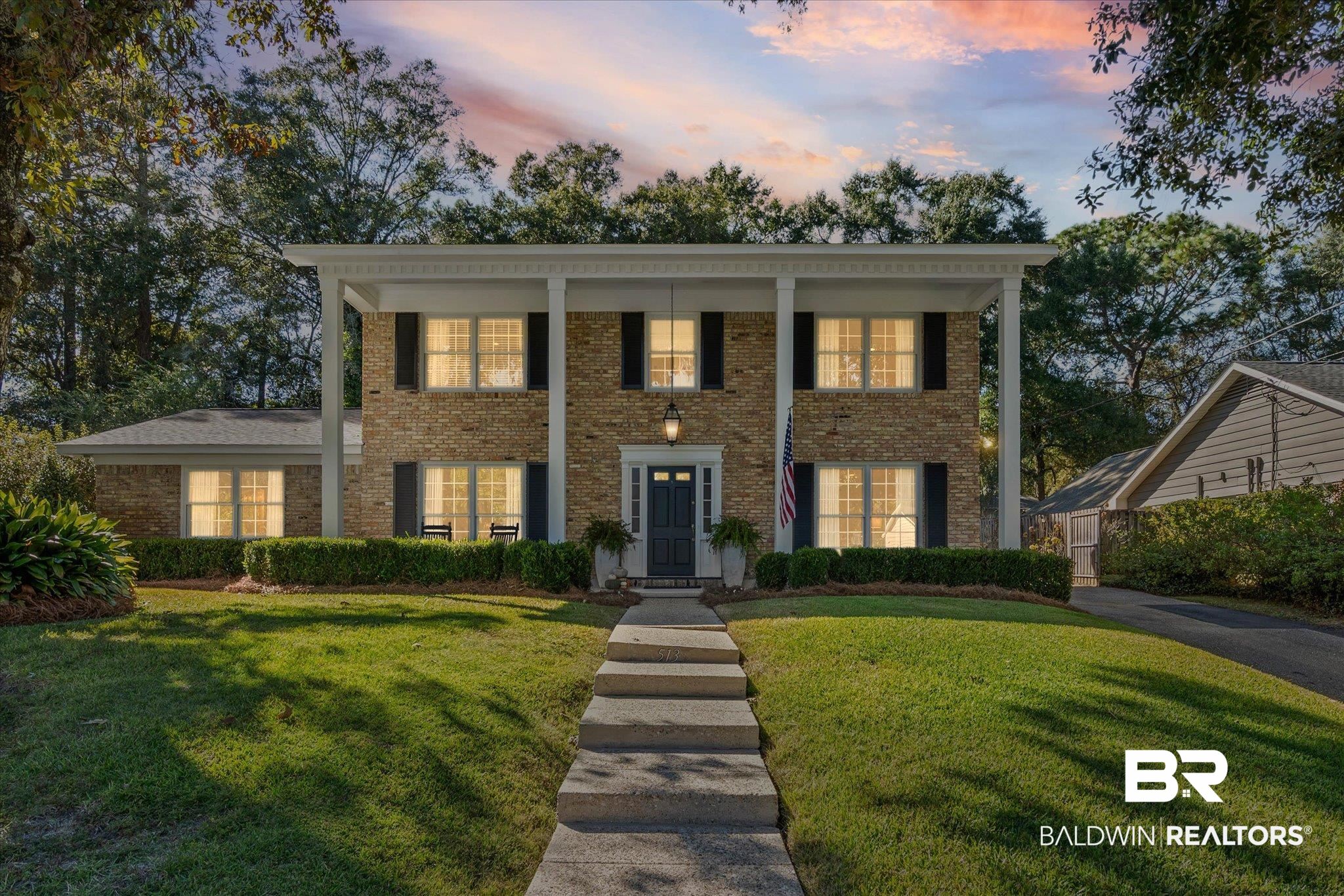 513 Spring Park Drive East Mobile, AL 36608 - Photo 41 of 44 Neoclassical / greek revival house with a lawn, brick siding, and a porch