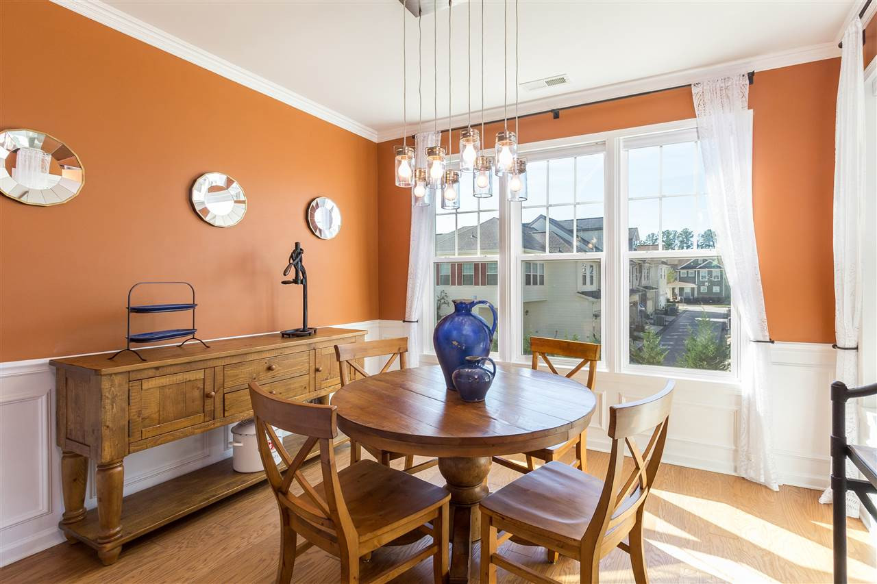 9135 Falkwood Road Raleigh, NC 27617 - Photo 13 of 25 Light and bright with wainscoting and new chandelier. Dining Room