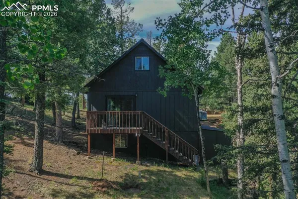 a house with trees in front of it