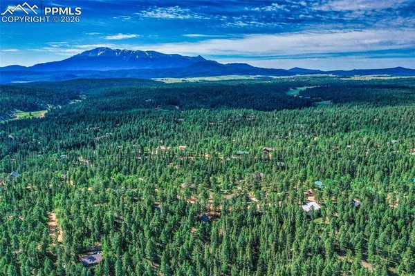 a view of mountain with lake