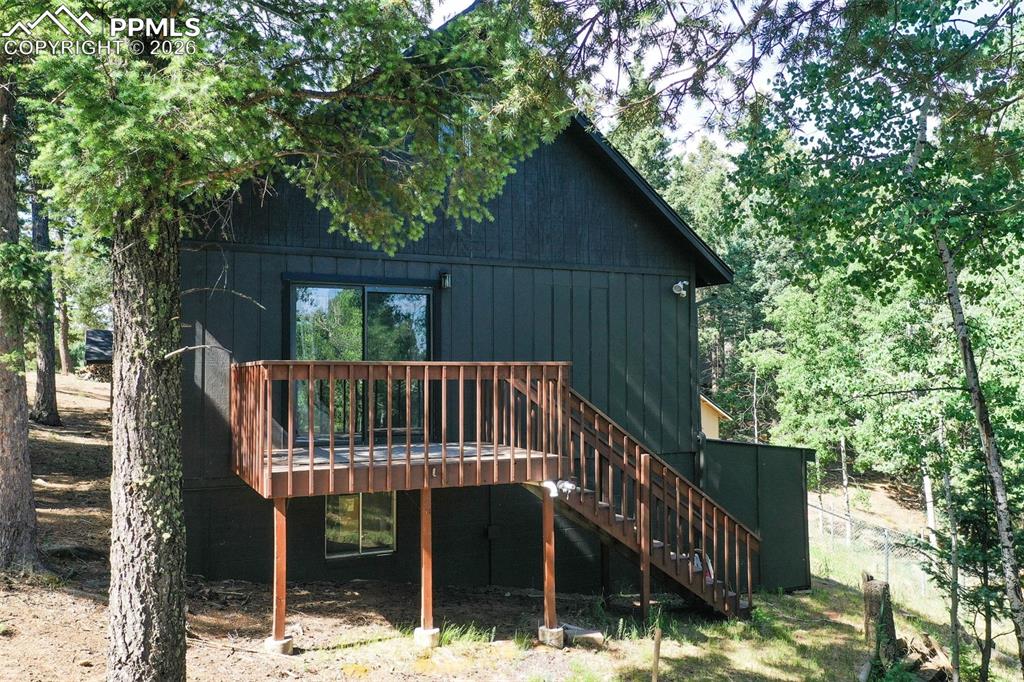 377 Ridge Road Divide, CO 80814 - Photo 48 of 50 a view of a wooden deck with a small yard