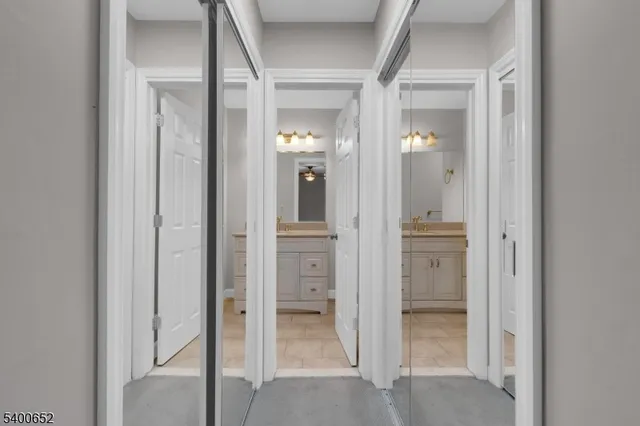 wooden floor with a bathroom