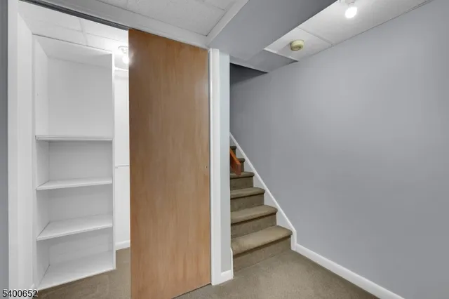 a view of entryway with stairs