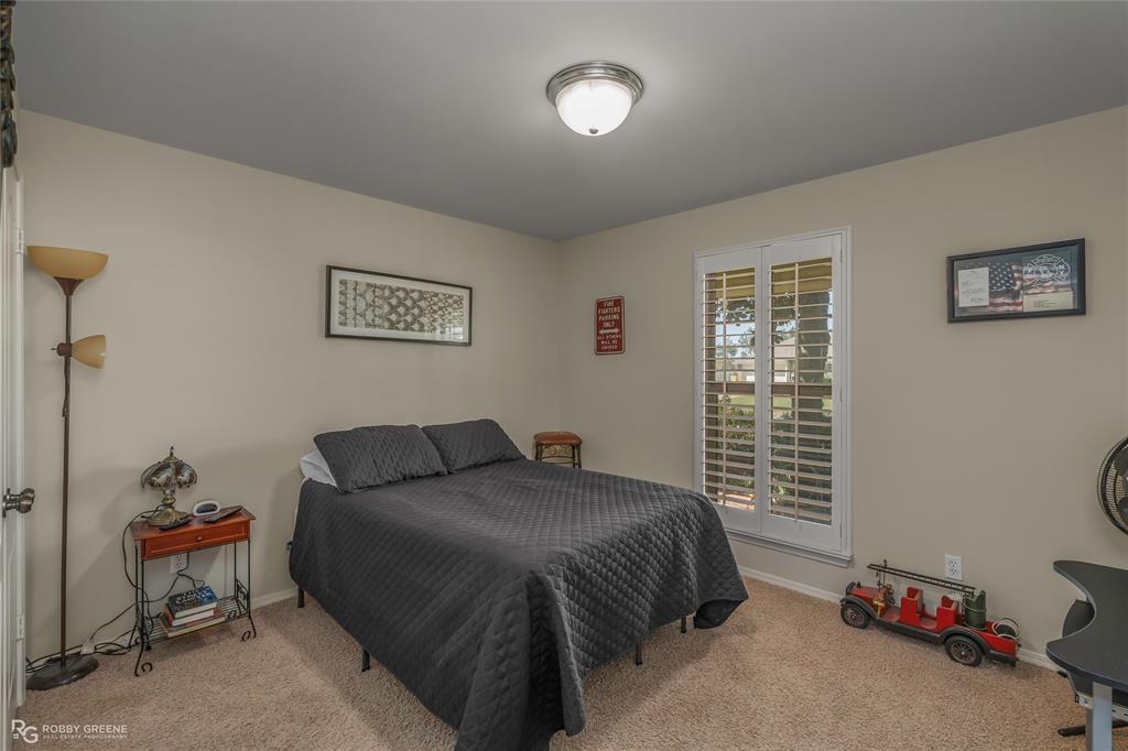 7193 Laurel Ridge Drive Greenwood, LA 71033 - Photo 33 of 40 Bedroom featuring light colored carpet