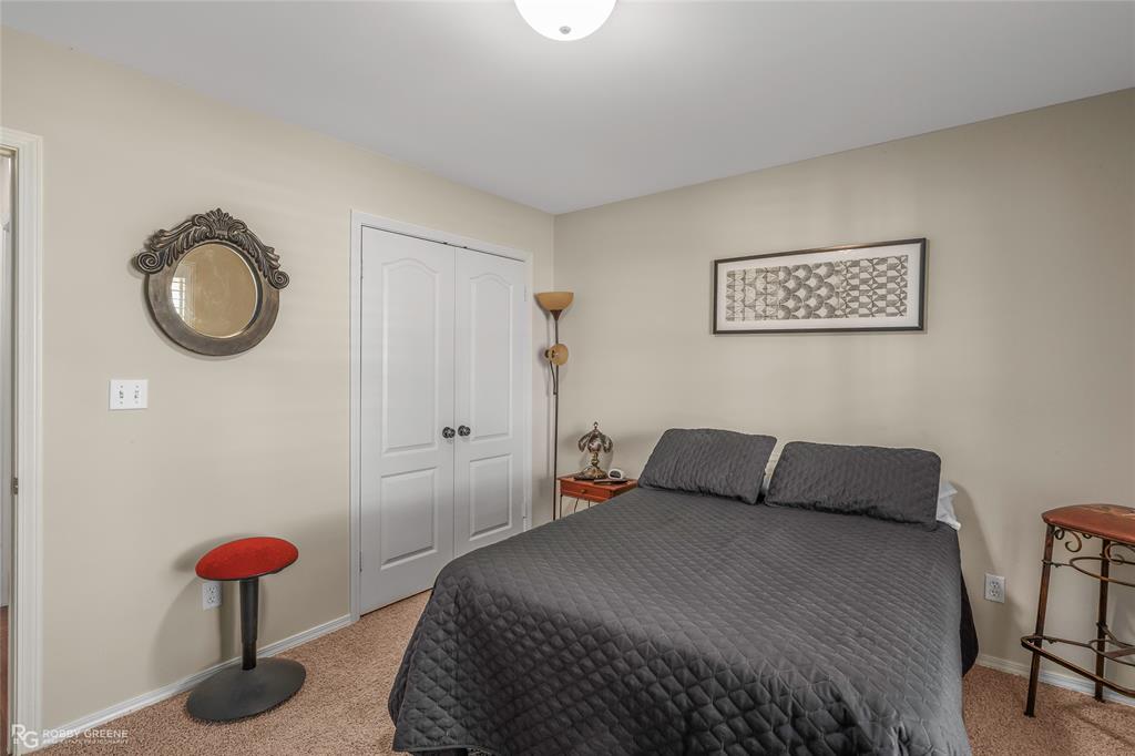 7193 Laurel Ridge Drive Greenwood, LA 71033 - Photo 34 of 40 Bedroom with light carpet and a closet