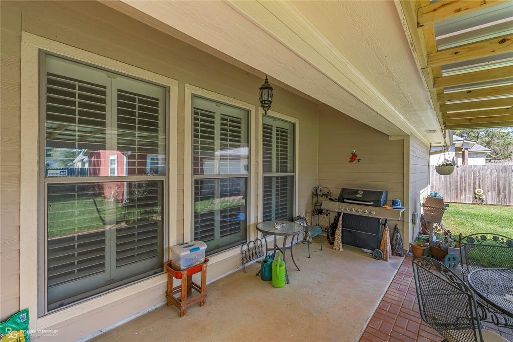 7193 Laurel Ridge Drive Greenwood, LA 71033 - Photo 5 of 40 View of patio with a grill and outdoor dining space