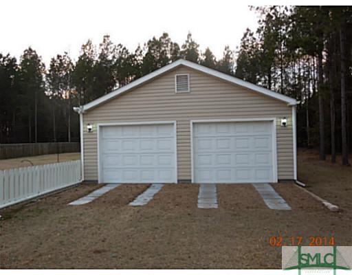 414 Shadowbrook Circle Springfield, GA 31329 - Photo 11 of 15 Parking Lot/Garage. 24 X44 3 car garage w/workshop