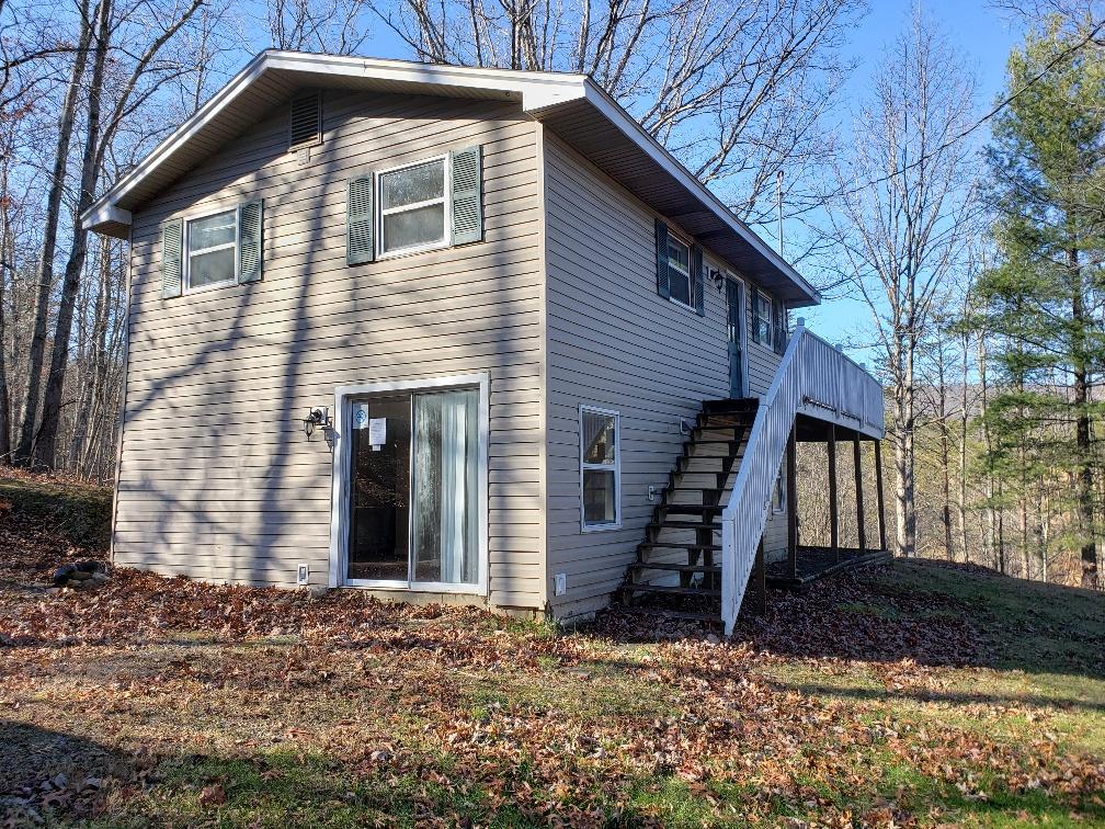 2121 Byrd Road Elliston, VA 24087 - Photo 6 of 20 a front view of a house with a yard