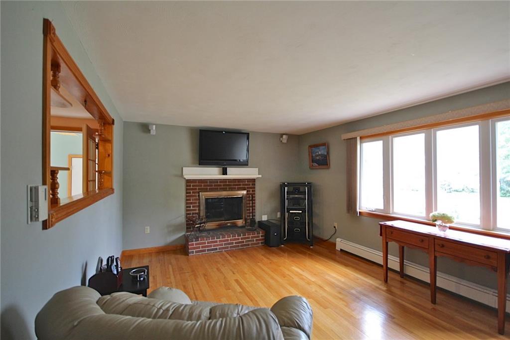 204 Main Street Springvale, ME 04083 - Photo 12 of 35 Nice living room with wood flooring...