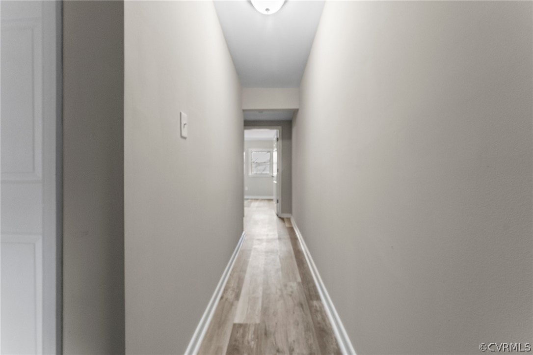 452 Harding Street Petersburg, VA 23803 - Photo 32 of 39 a view of a hallway with wooden floor