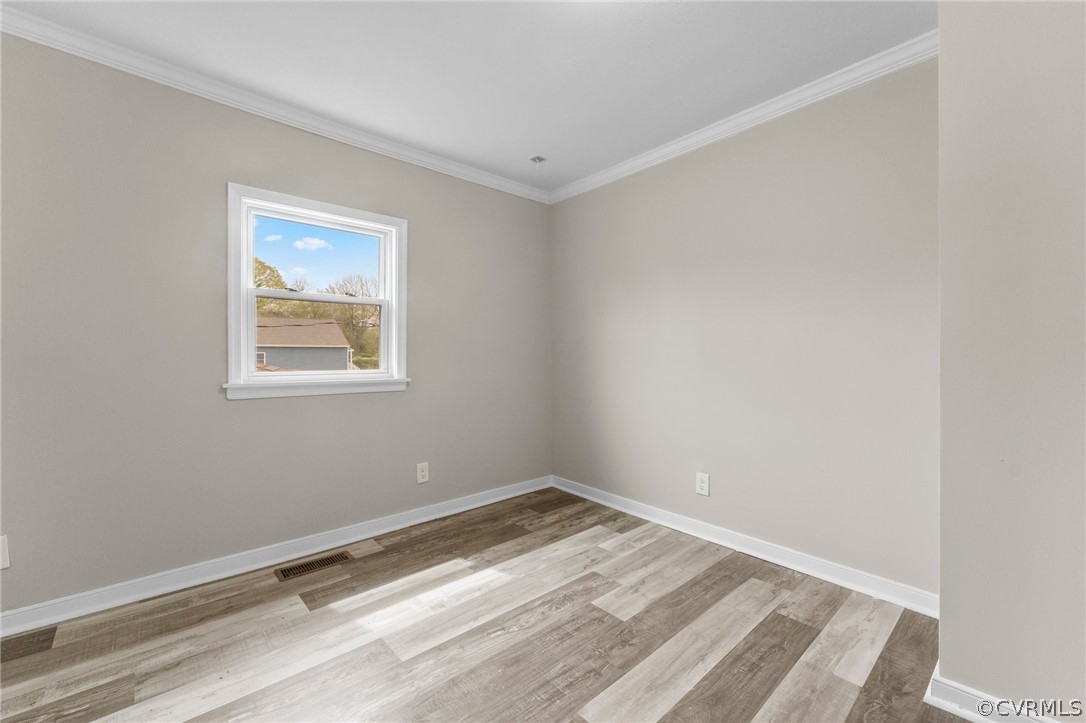 452 Harding Street Petersburg, VA 23803 - Photo 35 of 39 a view of a room with wooden floor and a window