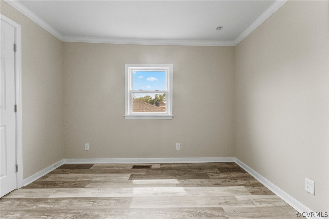 452 Harding Street Petersburg, VA 23803 - Photo 36 of 39 a view of a room with wooden floor and window