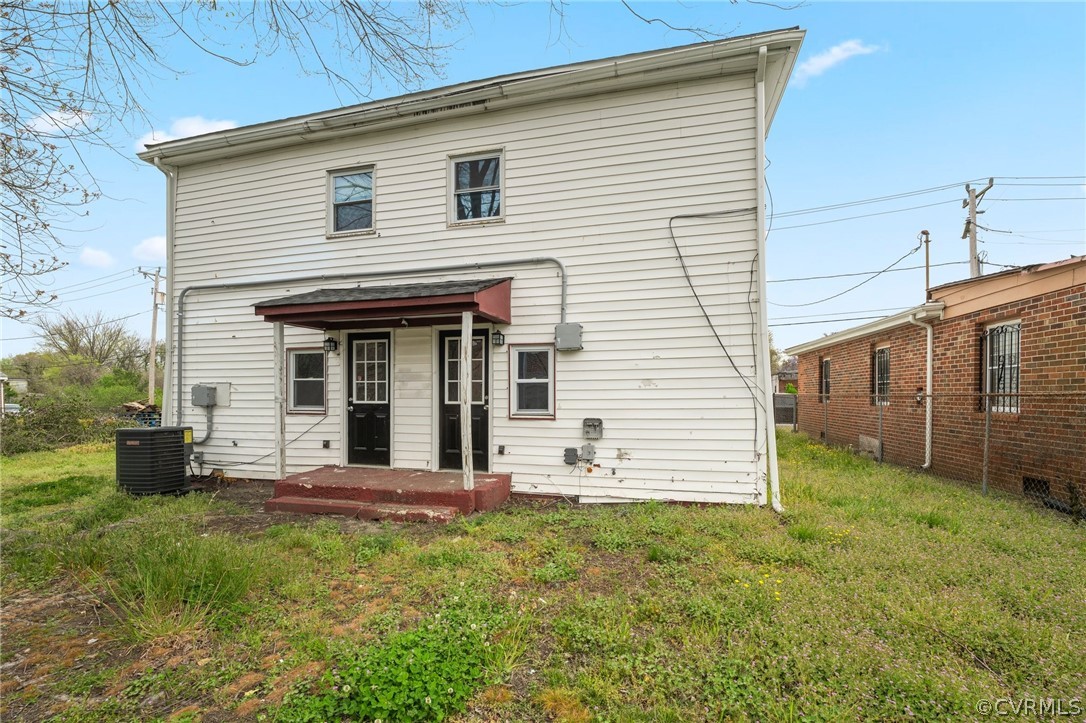 452 Harding Street Petersburg, VA 23803 - Photo 5 of 39 a view of a house with a yard