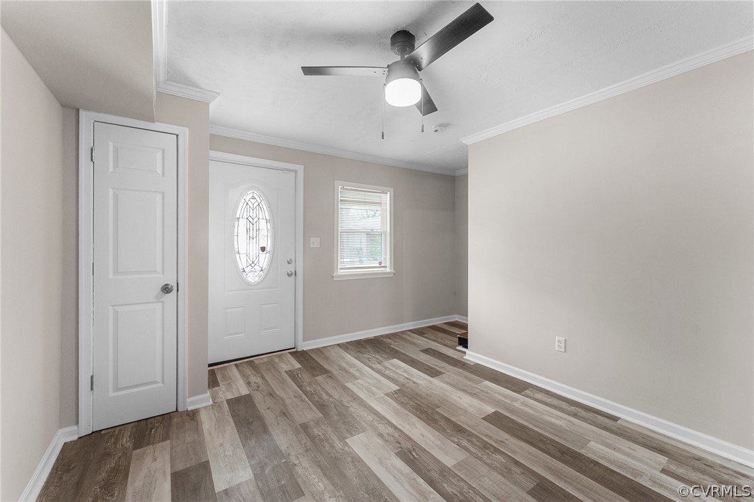 452 Harding Street Petersburg, VA 23803 - Photo 7 of 39 wooden floor in an empty room with a window