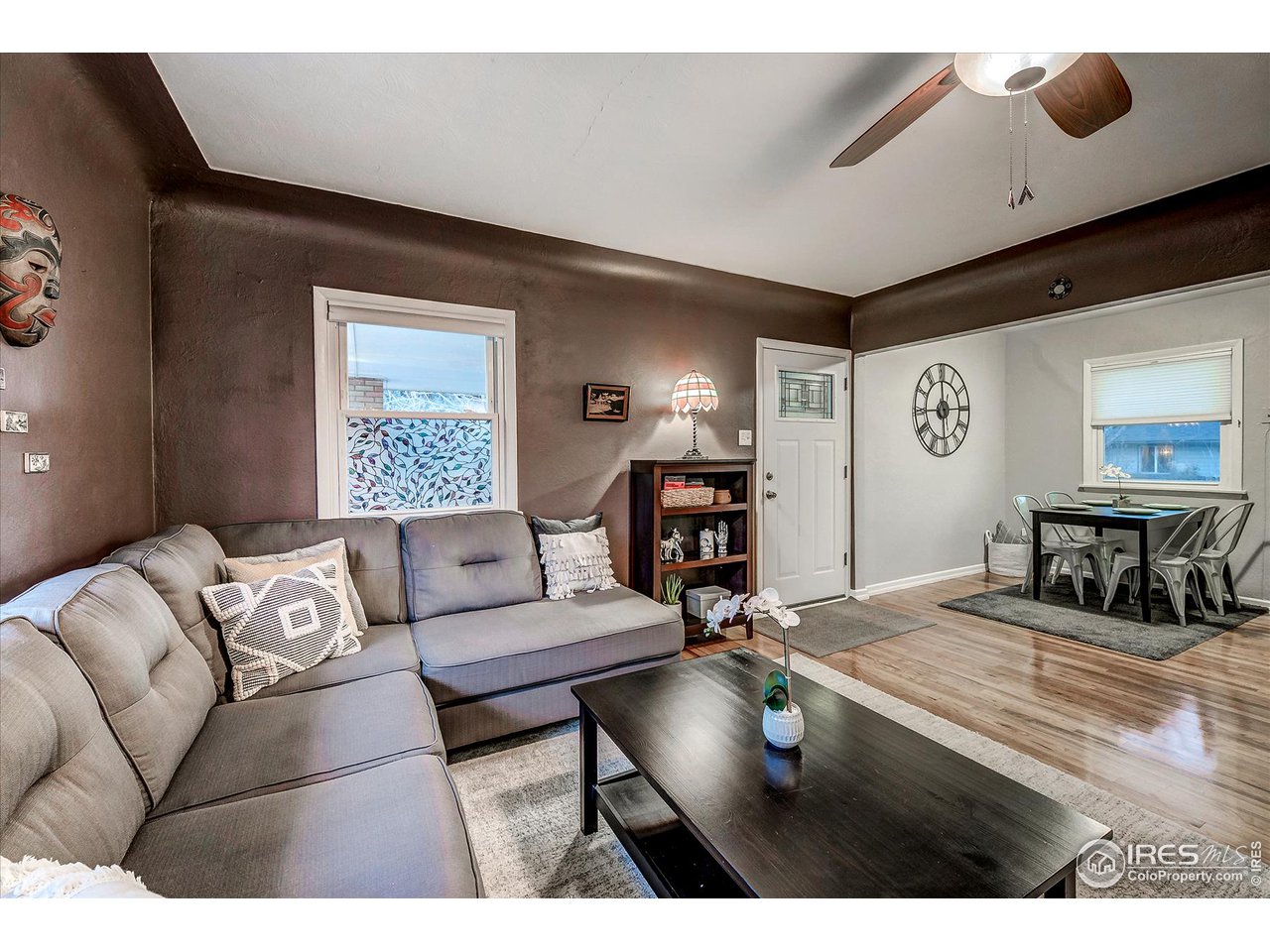 4 Sunset Circle Longmont, CO 80501 - Photo 3 of 12 Living area flows into the dining space