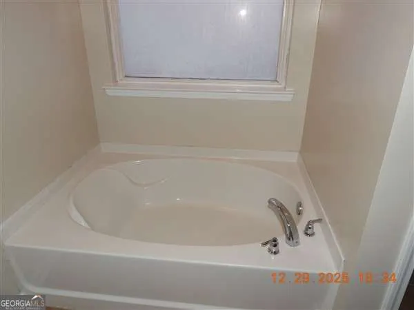 a bathroom with a bathtub