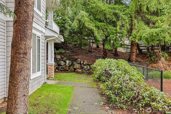 a view of a yard in front of a house