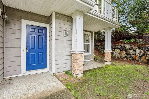 front view of a house with a yard