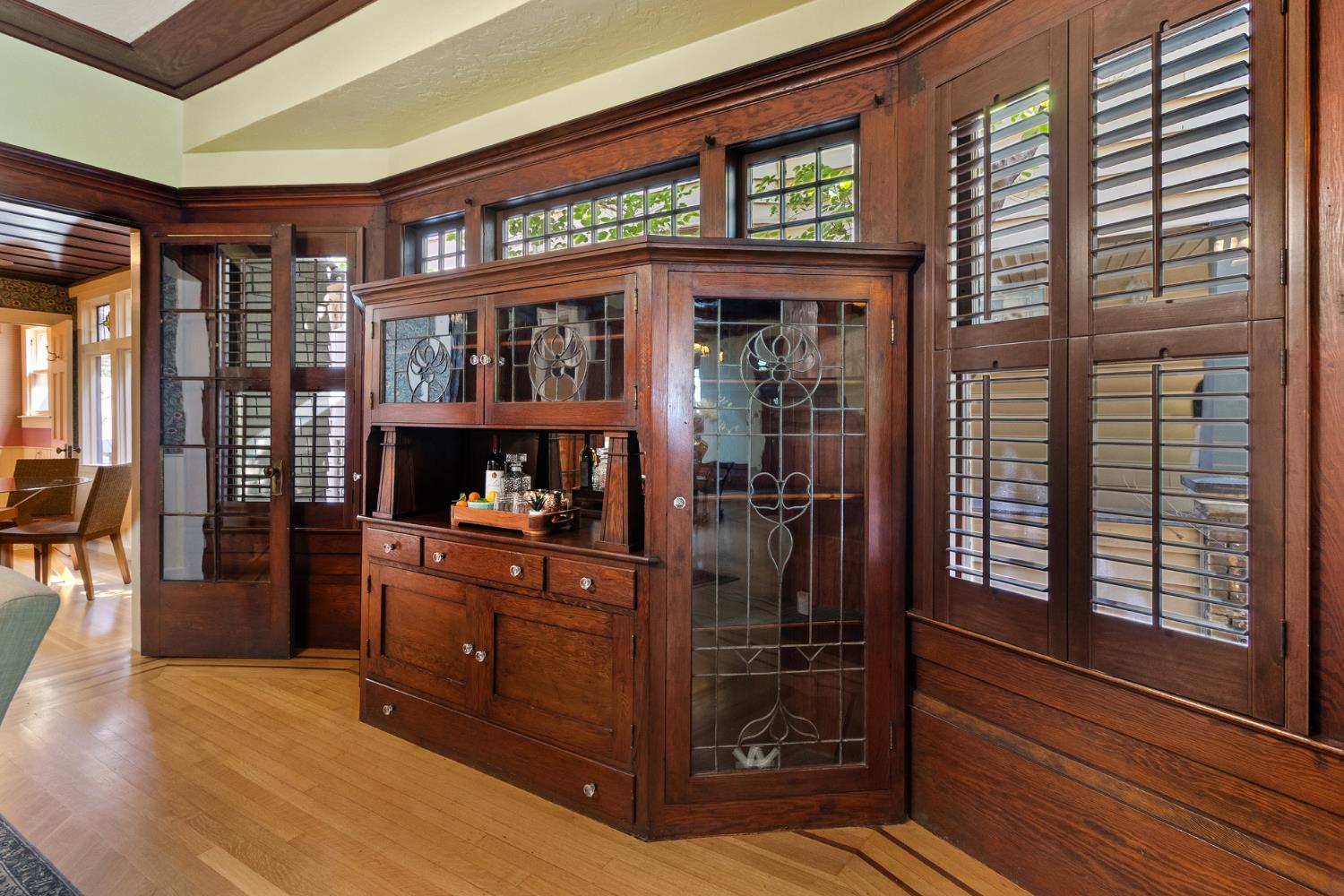 1705 H Street Sacramento, CA 95811 - Photo 12 of 50 a room that has a chair and a large window