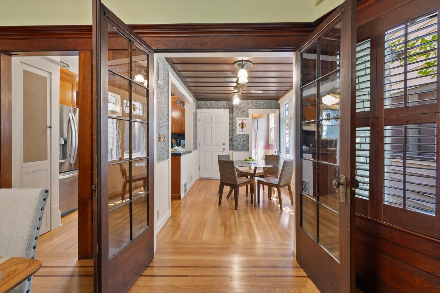 1705 H Street Sacramento, CA 95811 - Photo 14 of 50 a view of a dining room with furniture window and wooden floor