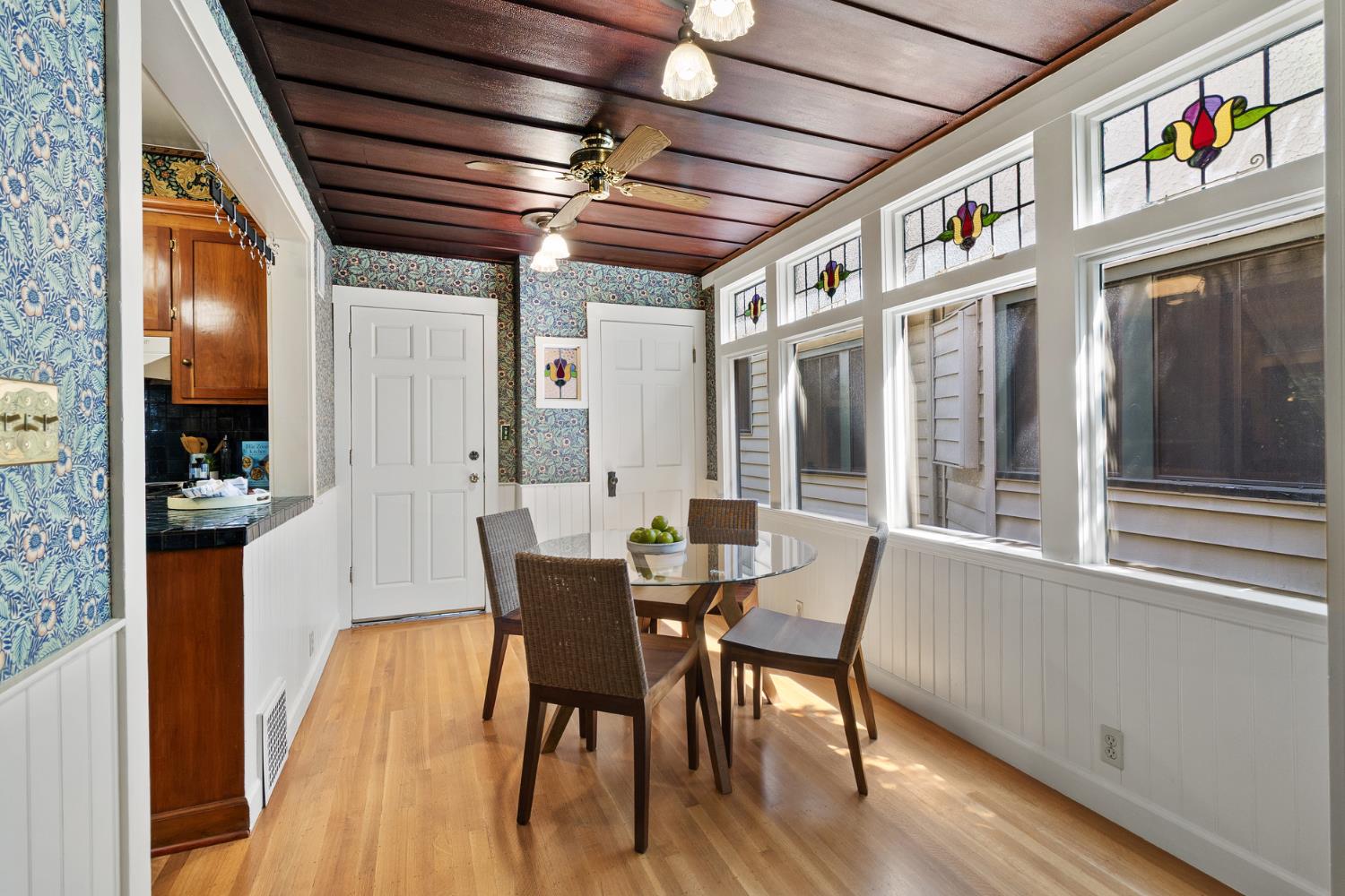 1705 H Street Sacramento, CA 95811 - Photo 15 of 50 a view of a dining room with furniture window and wooden floor