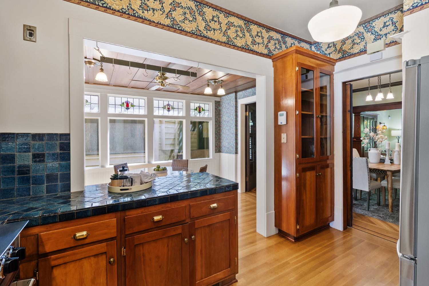 1705 H Street Sacramento, CA 95811 - Photo 23 of 50 a bathroom with a granite countertop sink and a mirror