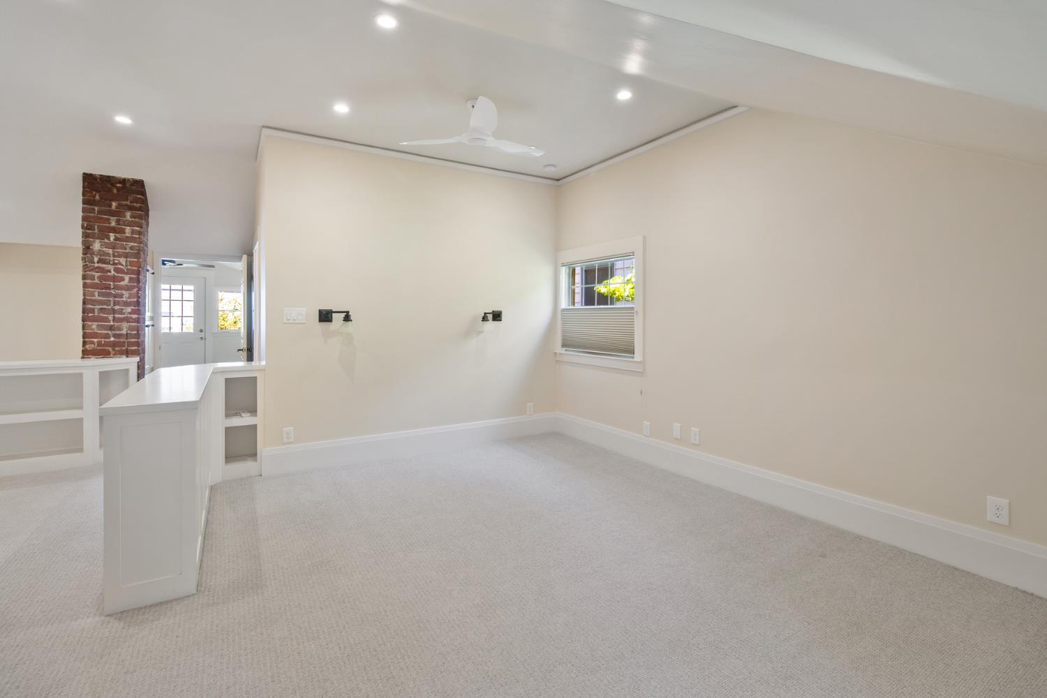 1705 H Street Sacramento, CA 95811 - Photo 32 of 50 an empty room with windows and entrance