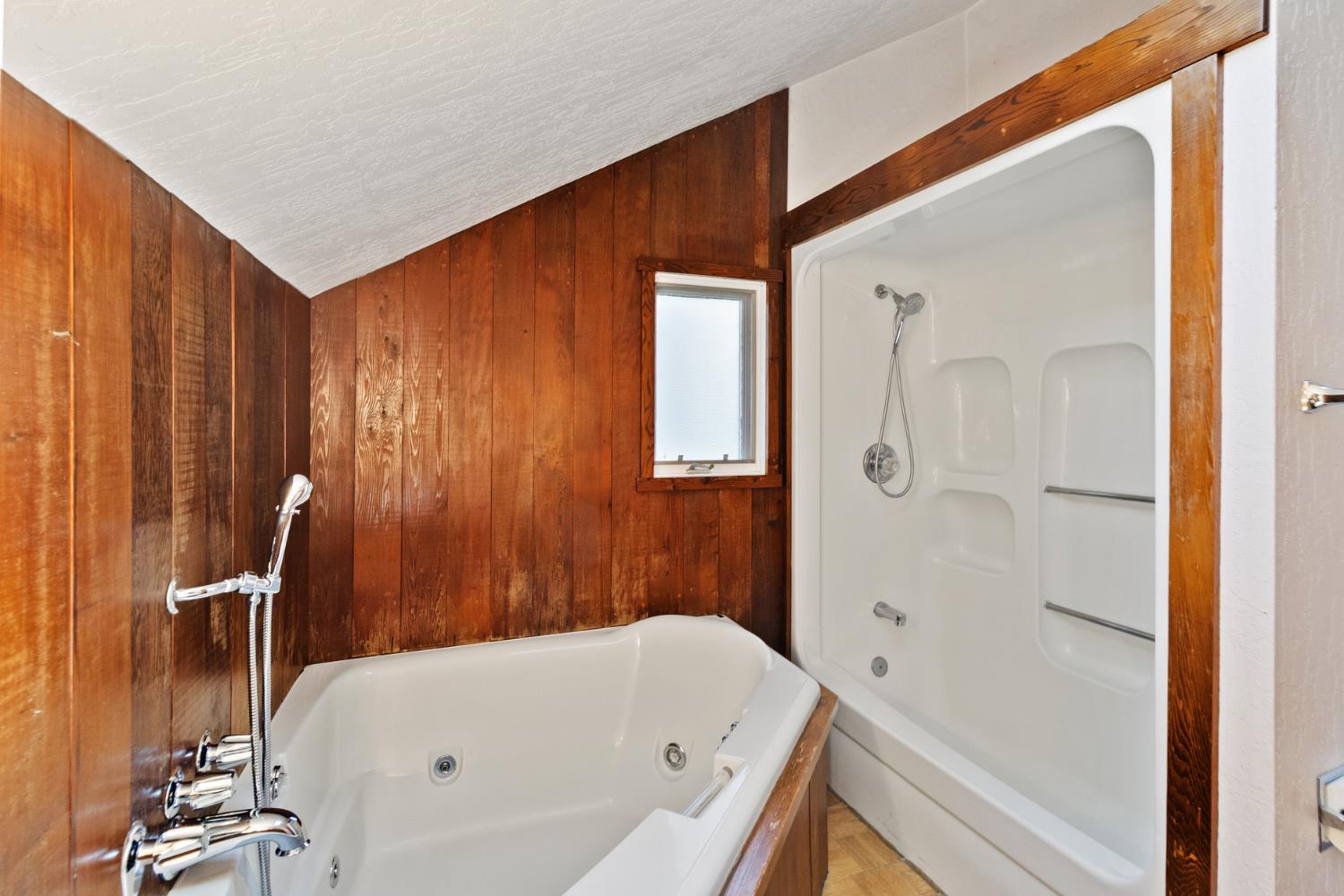 1705 H Street Sacramento, CA 95811 - Photo 36 of 50 a bathroom with a tub and shower