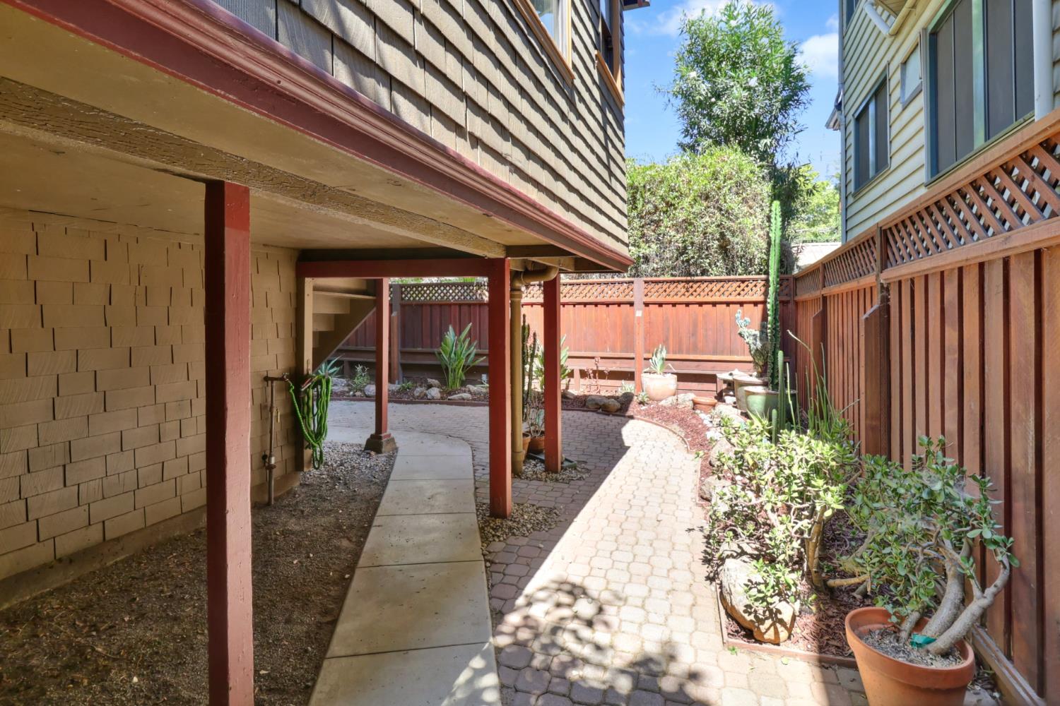 1705 H Street Sacramento, CA 95811 - Photo 48 of 50 a view of a patio with table and chairs and potted plants