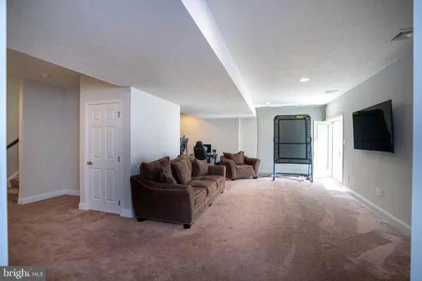 a view of a bathroom from a hallway