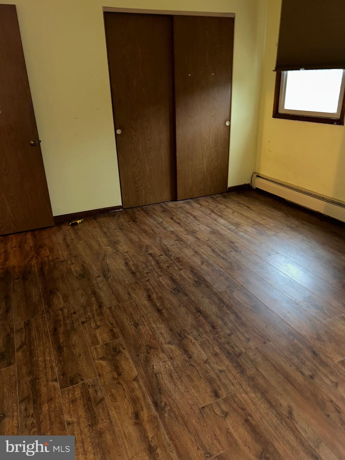 1535 Fieldwood Road Southampton, PA 18966 - Photo 23 of 33 an empty room with wooden floor and windows