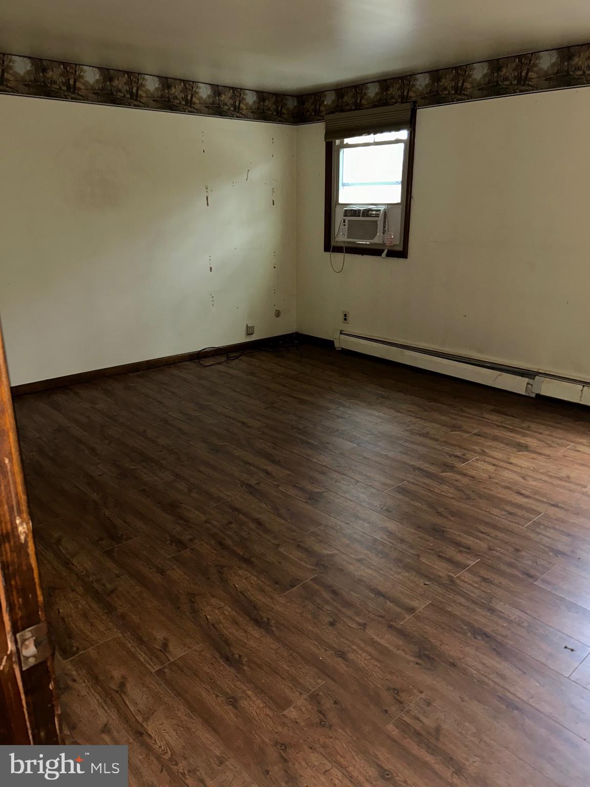 1535 Fieldwood Road Southampton, PA 18966 - Photo 24 of 33 an empty room with wooden floor and windows