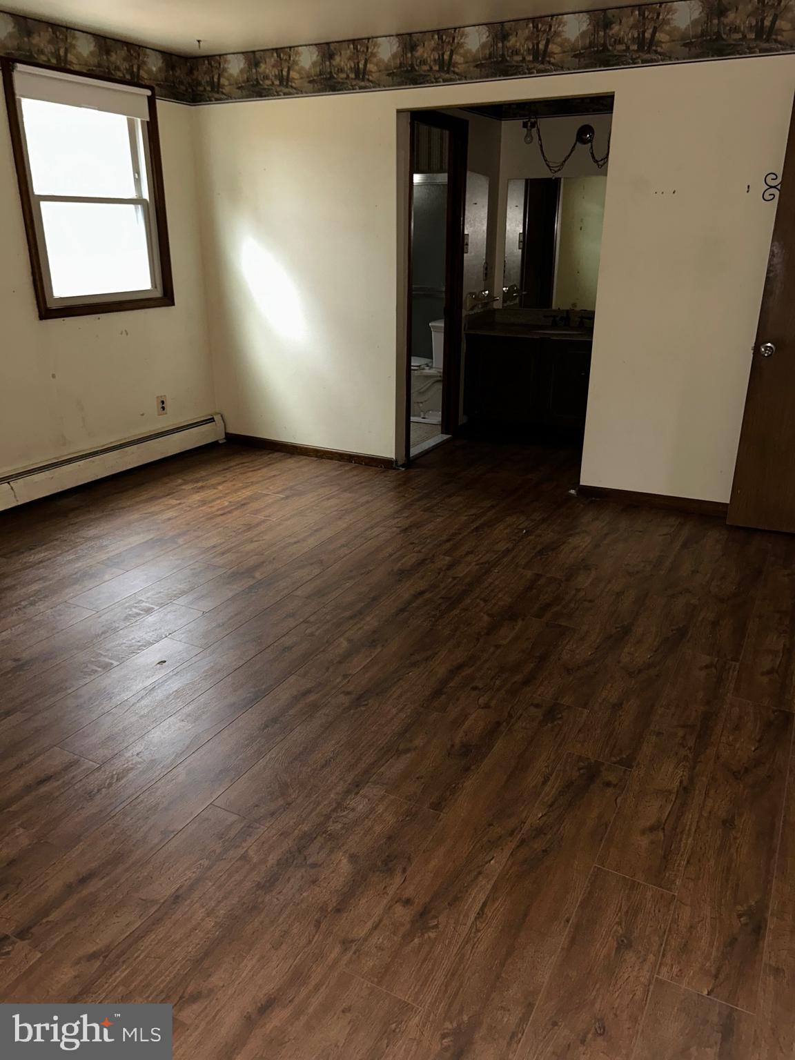 1535 Fieldwood Road Southampton, PA 18966 - Photo 25 of 33 an empty room with wooden floor and windows