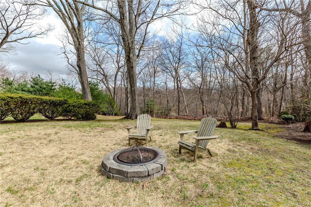 185 Parkside Avenue Pawtucket, RI 02861 - Photo 20 of 31 Yard with fire pit
