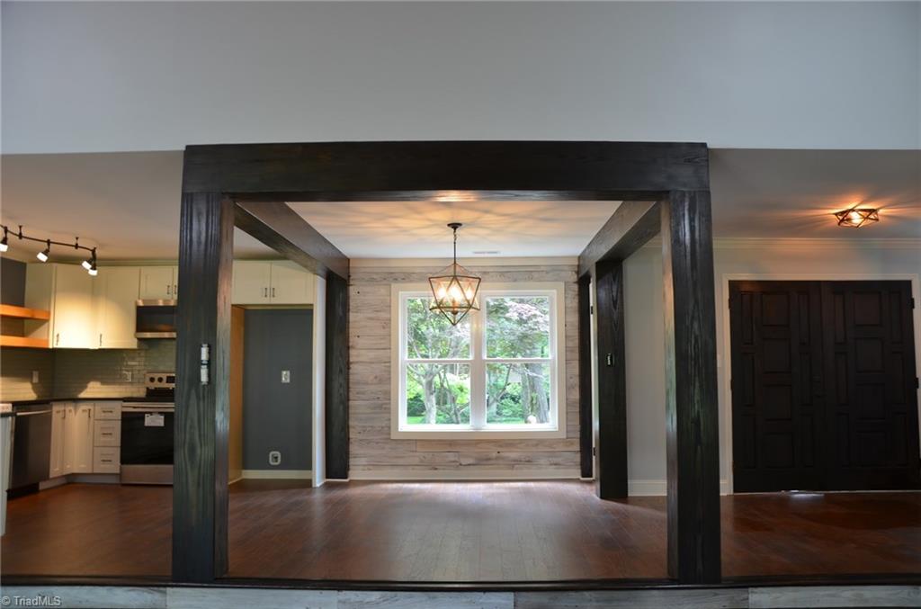 8855 Kings Tree Road Lewisville, NC 27023 - Photo 22 of 29 A look through the dining area to the front yard.